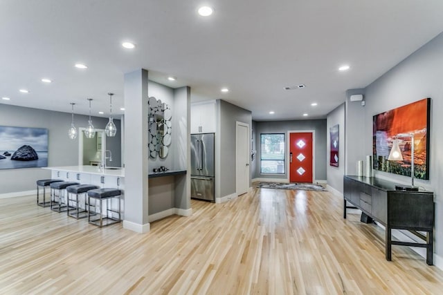3866 Lively Ln, Dallas, TX 75220 - entrance foyer with light wood-style flooring and recessed lighting