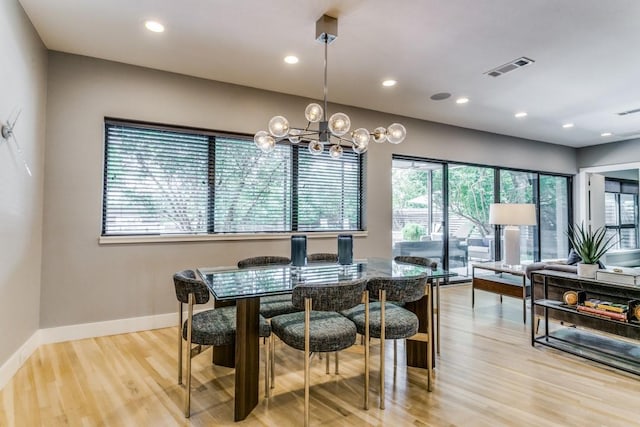 3866 Lively Ln, Dallas, TX 75220 - dining area with a chandelier, light wood finished floors, and recessed lighting