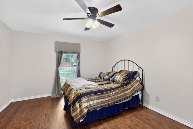 3302 Janwood Ln, Garland, TX 75044 - bedroom with wood finished floors and ceiling fan