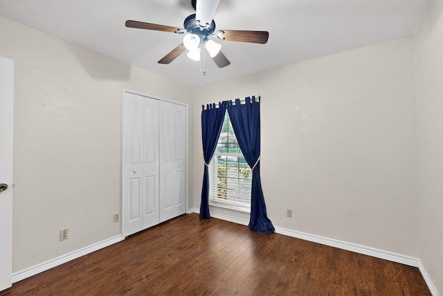 3302 Janwood Ln, Garland, TX 75044 - unfurnished bedroom with wood finished floors, a closet, and ceiling fan