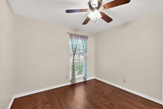 3302 Janwood Ln, Garland, TX 75044 - empty room featuring dark wood-style floors and a ceiling fan