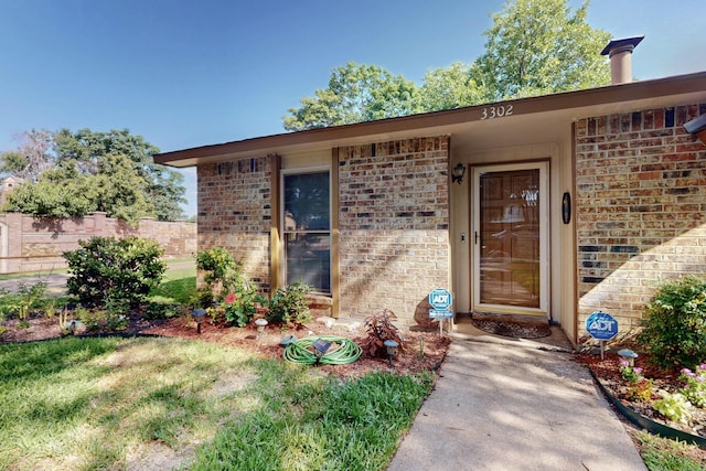 3302 Janwood Ln, Garland, TX 75044 - view of exterior entry with brick siding