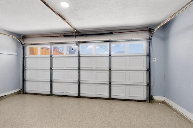 3302 Janwood Ln, Garland, TX 75044 - garage with baseboards