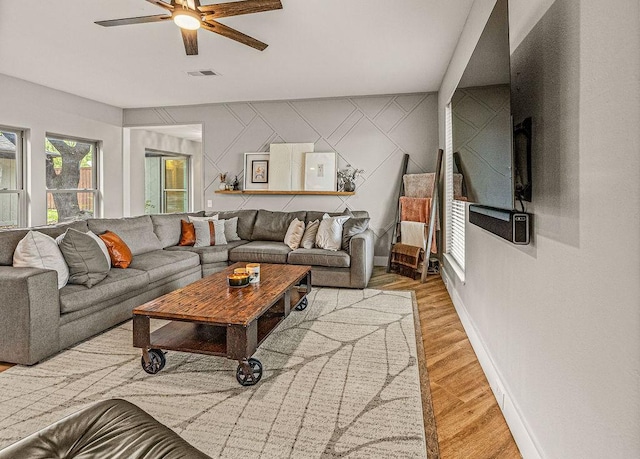 6005 Costera Ln, Dallas, TX 75248 - living area featuring ceiling fan and wood finished floors