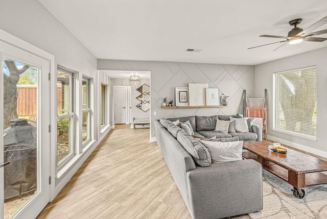 6005 Costera Ln, Dallas, TX 75248 - living area featuring light wood finished floors and ceiling fan