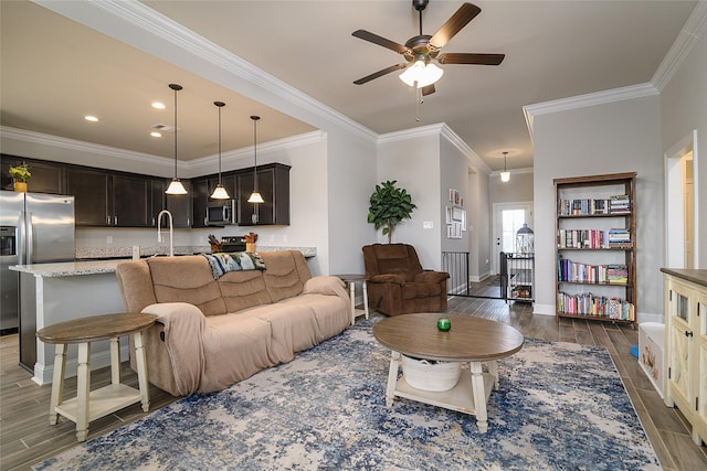 206 Berkshire Pl, Haughton, LA 71037 - living room featuring wood finished floors, ceiling fan, ornamental molding, and recessed lighting