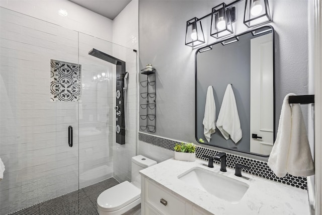 1030 Double B Trl, Prosper, TX 75078 - bathroom featuring a shower stall, vanity, and tasteful backsplash