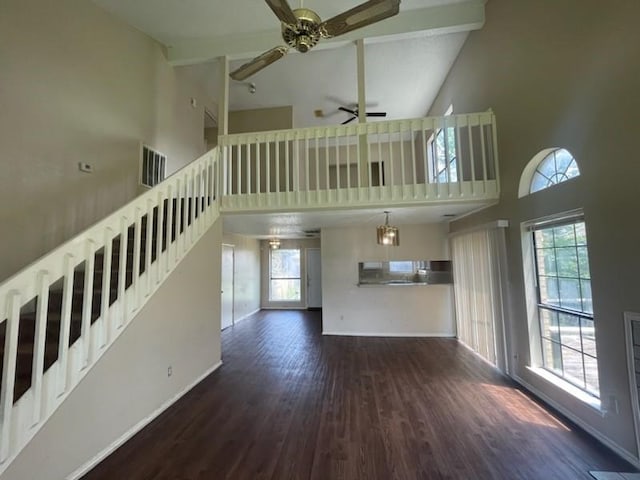 11805 Eloise Dr, Balch Springs, TX 75180 - unfurnished living room featuring high vaulted ceiling, a ceiling fan, wood finished floors, and stairs