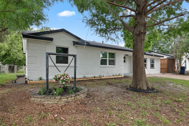 4118 Princeton Dr, Garland, TX 75042 - single story home featuring brick siding and a gate