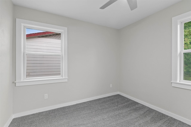 4118 Princeton Dr, Garland, TX 75042 - empty room with dark colored carpet and a ceiling fan