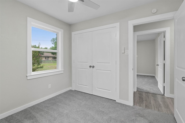 4118 Princeton Dr, Garland, TX 75042 - unfurnished bedroom featuring carpet floors, a closet, and a ceiling fan