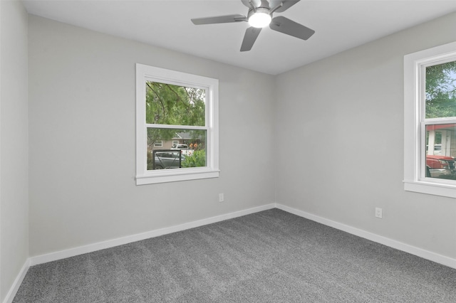 4118 Princeton Dr, Garland, TX 75042 - carpeted empty room with plenty of natural light and ceiling fan