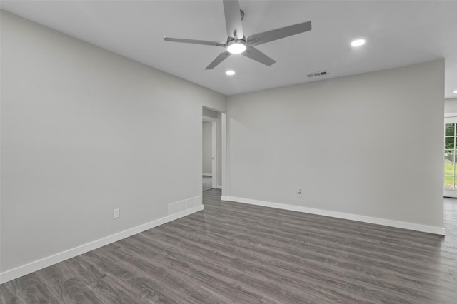 4118 Princeton Dr, Garland, TX 75042 - empty room featuring dark wood-style floors, recessed lighting, and ceiling fan