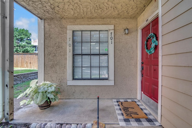 4748 Old Bent Tree Ln Unit 701, Dallas, TX 75287 - doorway to property featuring stucco siding