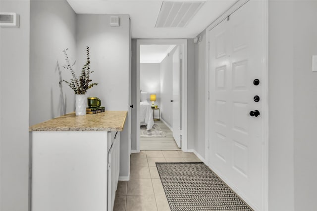 4748 Old Bent Tree Ln Unit 701, Dallas, TX 75287 - corridor with light tile patterned flooring and baseboards