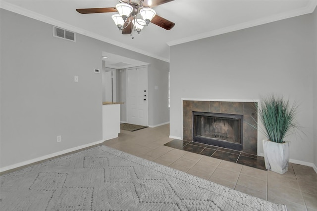 4748 Old Bent Tree Ln Unit 701, Dallas, TX 75287 - tiled living room featuring a ceiling fan, ornamental molding, and a fireplace