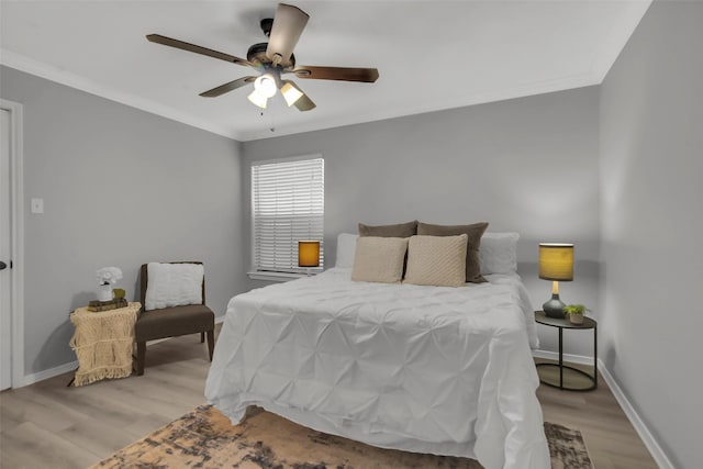 4748 Old Bent Tree Ln Unit 701, Dallas, TX 75287 - bedroom featuring wood finished floors, ornamental molding, and ceiling fan