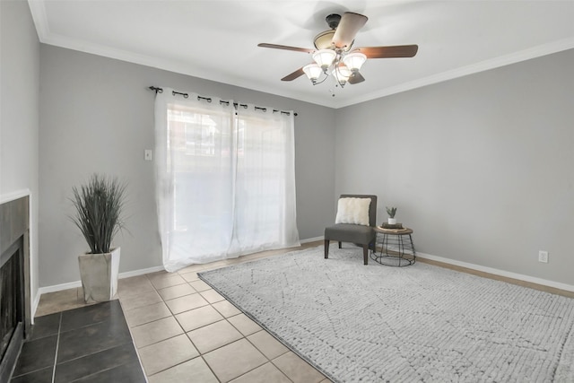 4748 Old Bent Tree Ln Unit 701, Dallas, TX 75287 - living area with a ceiling fan, a fireplace, tile patterned flooring, and ornamental molding