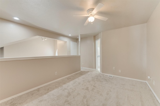 4422 Point Blvd Unit 210C, Garland, TX 75043 - carpeted empty room with a ceiling fan and recessed lighting