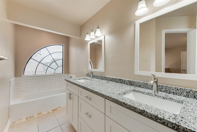 4422 Point Blvd Unit 210C, Garland, TX 75043 - full bathroom with double vanity, a garden tub, and tile patterned floors