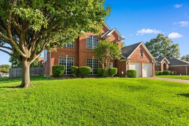 1100 Bellingham Pl, Arlington, TX 76001 - view of front of house featuring brick siding, driveway, and a garage