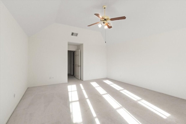 1100 Bellingham Pl, Arlington, TX 76001 - spare room with lofted ceiling, a ceiling fan, and light colored carpet