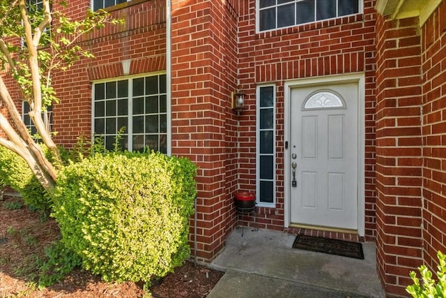 1100 Bellingham Pl, Arlington, TX 76001 - doorway to property featuring brick siding