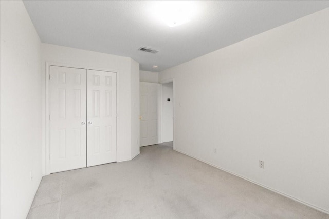 1100 Bellingham Pl, Arlington, TX 76001 - unfurnished bedroom with light carpet and a closet