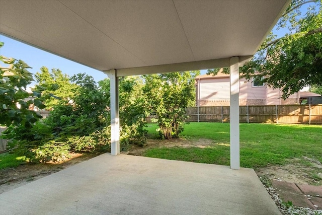 1100 Bellingham Pl, Arlington, TX 76001 - fenced backyard with a patio area