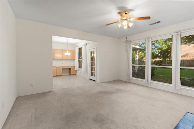 1100 Bellingham Pl, Arlington, TX 76001 - unfurnished living room featuring ceiling fan and light carpet