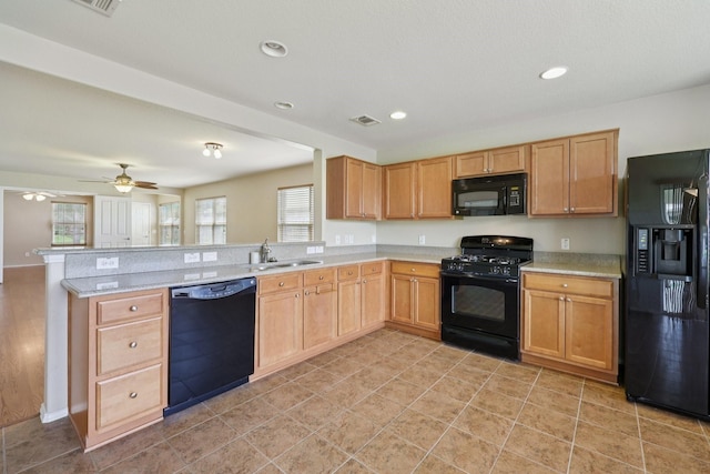 7850 Estancia Dr, Frisco, TX 75036 - kitchen featuring black appliances, light countertops, a peninsula, recessed lighting, and ceiling fan