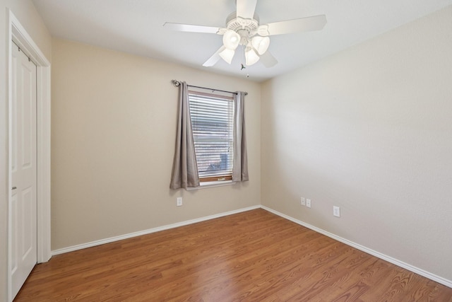 7850 Estancia Dr, Frisco, TX 75036 - unfurnished bedroom featuring wood finished floors, a closet, and ceiling fan