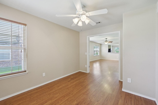 7850 Estancia Dr, Frisco, TX 75036 - spare room featuring ceiling fan and wood finished floors