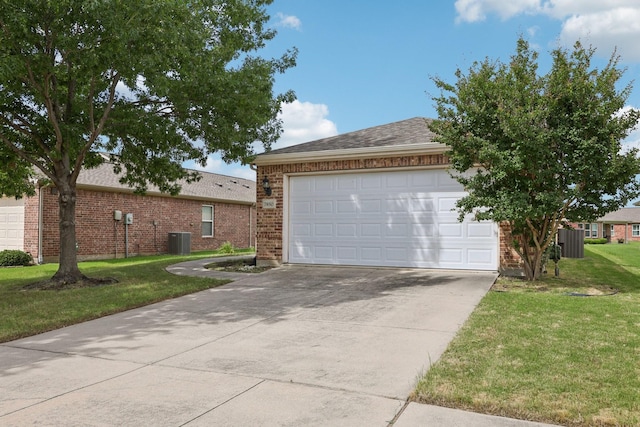 7850 Estancia Dr, Frisco, TX 75036 - view of front of property with driveway, a front yard, brick siding, and an attached garage
