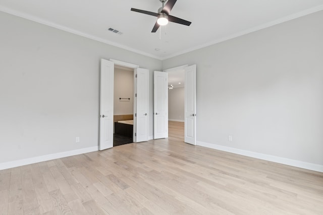 2300 Leonard St Unit 305, Dallas, TX 75201 - unfurnished bedroom featuring light wood-style flooring, ornamental molding, ensuite bath, and ceiling fan