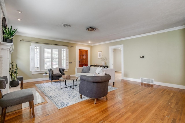 2012 Carleton Ave, Fort Worth, TX 76107 - living area with light wood finished floors, ornamental molding, and recessed lighting