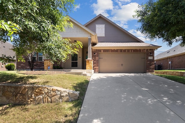 6308 Harold Creek Dr, Fort Worth, TX 76179 - craftsman inspired home featuring brick siding, a garage, concrete driveway, and a front lawn