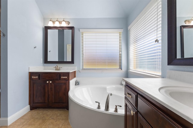 6308 Harold Creek Dr, Fort Worth, TX 76179 - full bathroom with two vanities, a garden tub, and tile patterned flooring