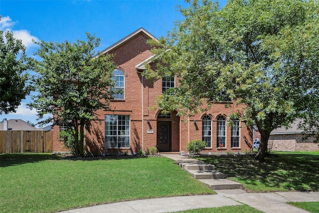 7305 Meadowwood Dr, Rowlett, TX 75089 - traditional-style home featuring brick siding
