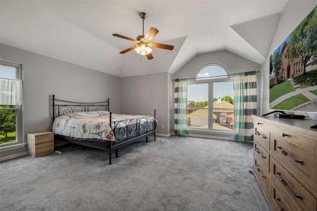 7305 Meadowwood Dr, Rowlett, TX 75089 - carpeted bedroom featuring vaulted ceiling, ceiling fan, and access to exterior