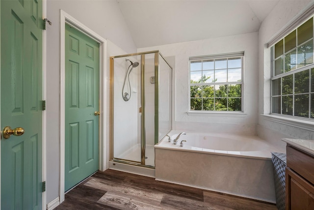 7305 Meadowwood Dr, Rowlett, TX 75089 - bathroom with vaulted ceiling, a bath, plenty of natural light, a stall shower, and vanity