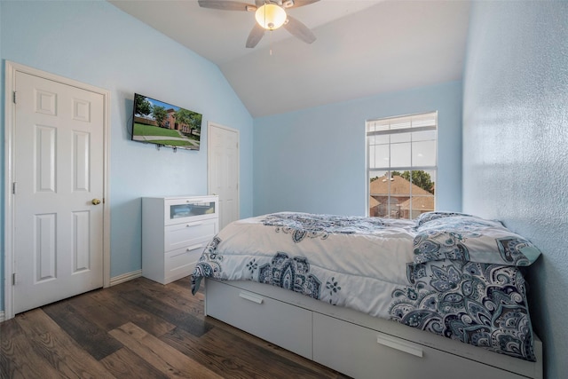 7305 Meadowwood Dr, Rowlett, TX 75089 - bedroom featuring vaulted ceiling, dark wood-type flooring, and ceiling fan