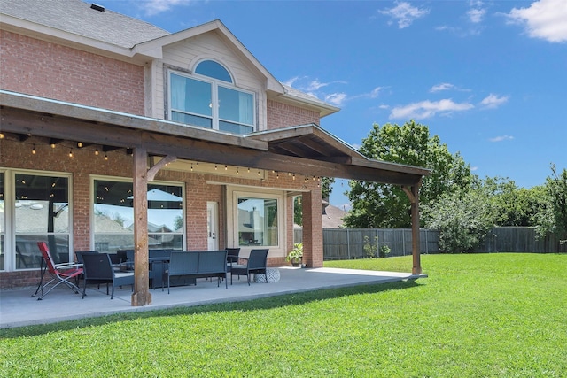 7305 Meadowwood Dr, Rowlett, TX 75089 - back of house featuring brick siding, a patio, and an outdoor hangout area