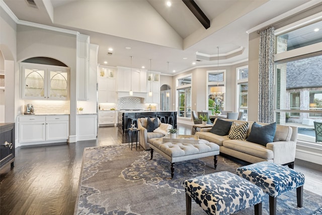 1800 Aspen St, Prosper, TX 75078 - living room featuring dark wood finished floors, arched walkways, recessed lighting, high vaulted ceiling, and beamed ceiling
