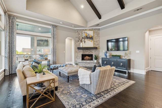 1800 Aspen St, Prosper, TX 75078 - living area with arched walkways, a fireplace, beam ceiling, wood finished floors, and high vaulted ceiling
