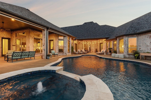 1800 Aspen St, Prosper, TX 75078 - pool at dusk with an outdoor living space, a patio, and a pool with connected hot tub
