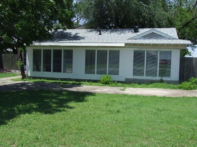1729 Lindy Ln, Irving, TX 75060 - back of house with a sunroom