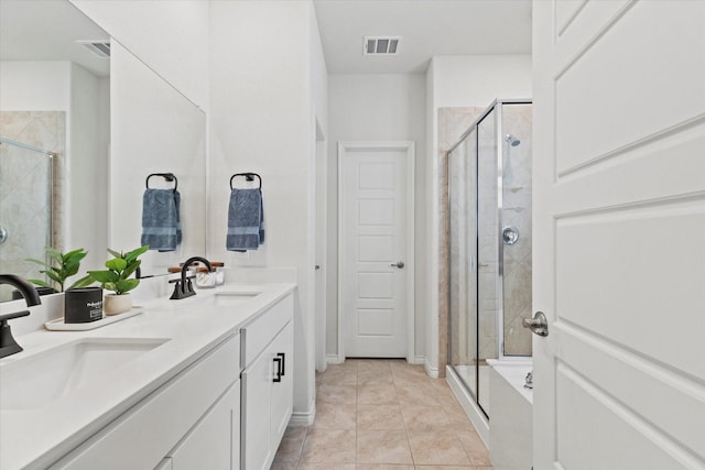 1512 Bennington Ln, Celina, TX 75009 - full bath with double vanity, a shower stall, and tile patterned flooring