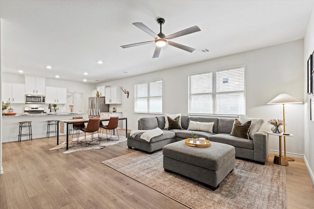 1512 Bennington Ln, Celina, TX 75009 - living area with light wood-style flooring, a ceiling fan, and recessed lighting