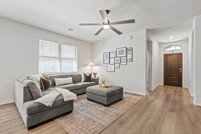 1512 Bennington Ln, Celina, TX 75009 - living area with ceiling fan and light wood-style flooring